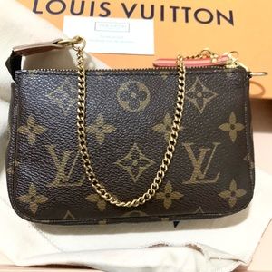 Louis Vuitton Inventeur Trunks & Locks Mini Pochette